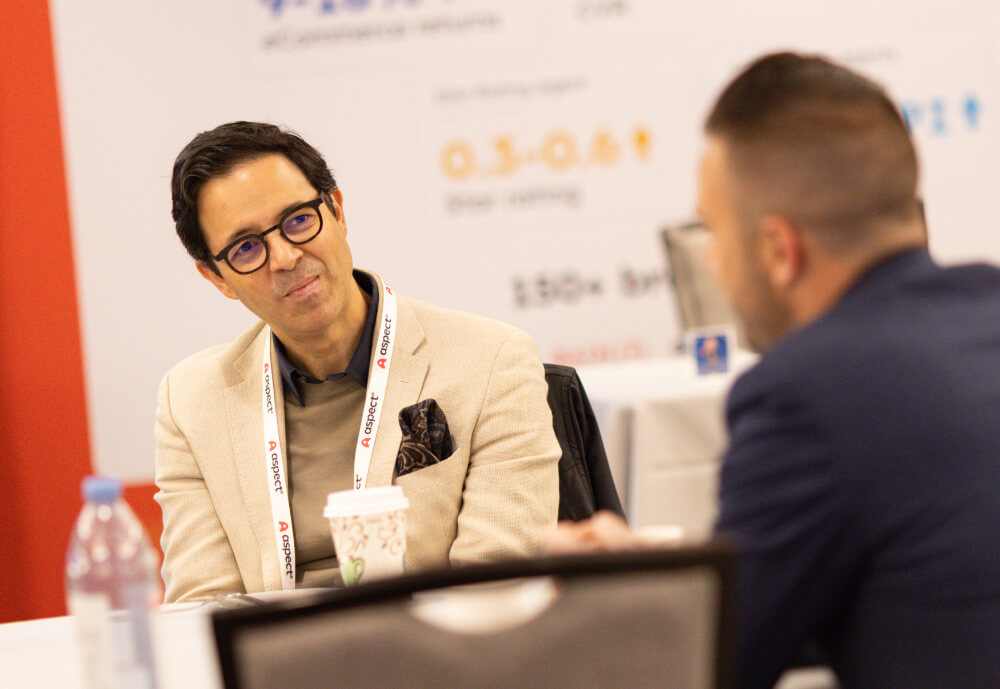 Two attendees Spend your time in meaningful conversations throughout a Reuters Events conference.