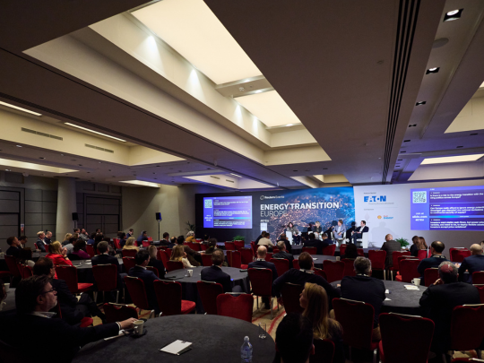 Audience watching a panel discussion on the Energy Transition Europe stage.