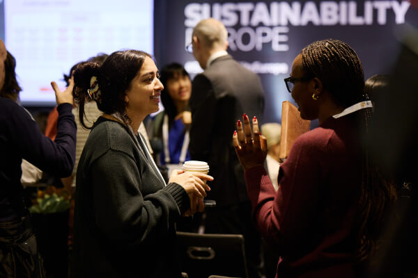 Coffee break and attendee networking at Sustainability Europe.