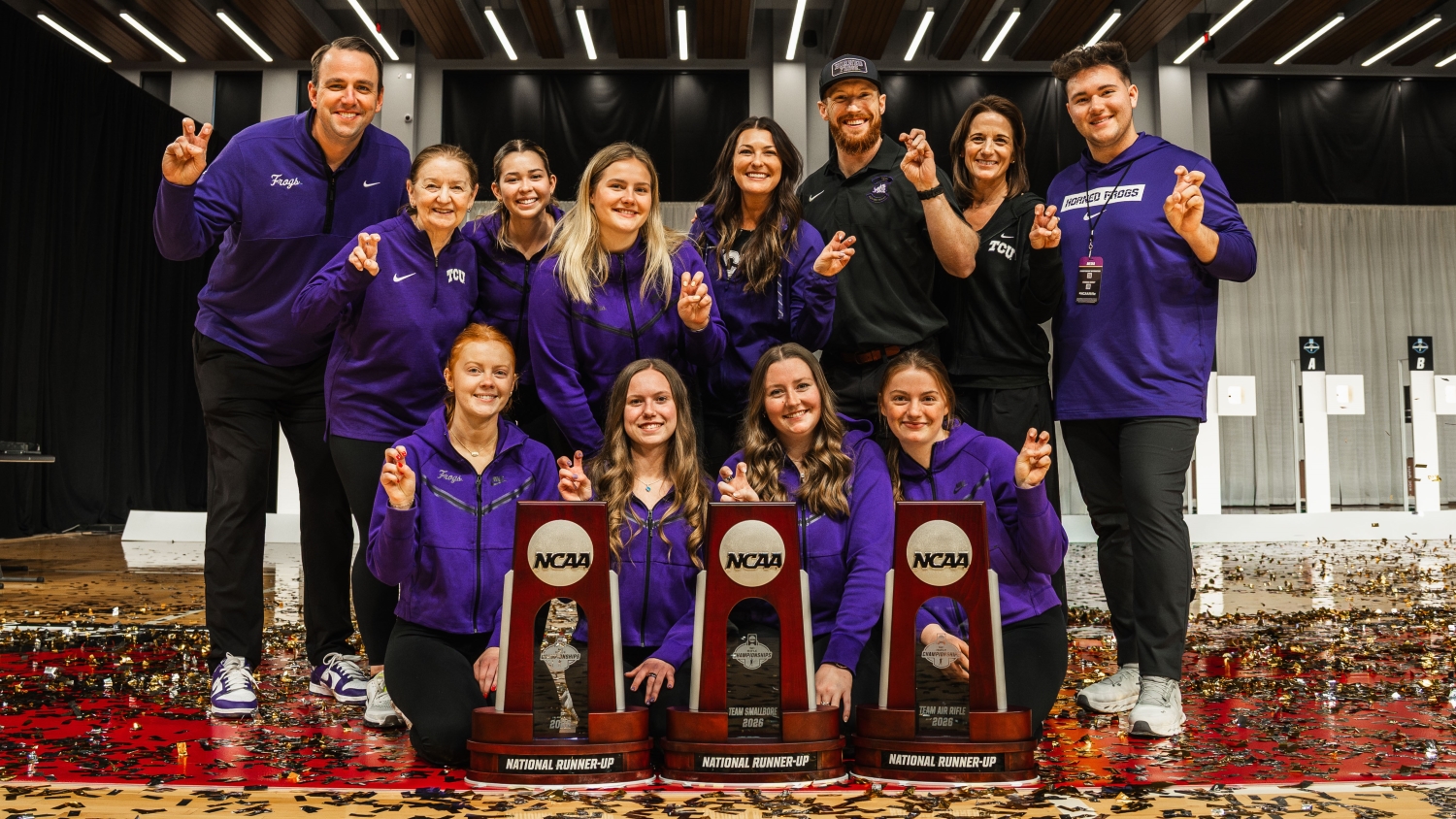 TCU Rifle Team poses with their three NCAA Championships trophies.