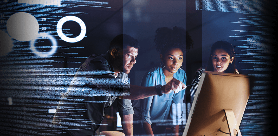 three people look at a screen